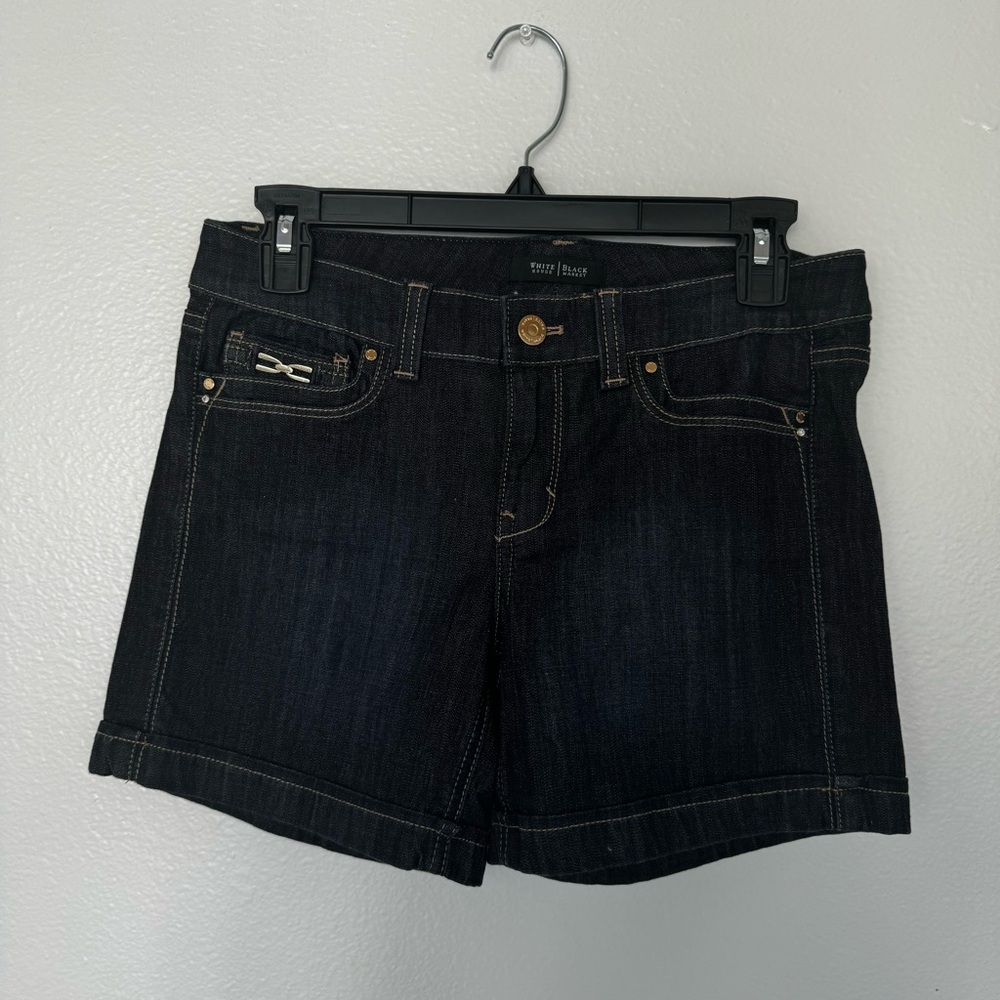 Black denim White house black market shorts with beige stitching in size 2